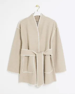 Beige stitch detail belted coat