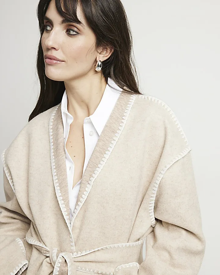 Beige stitch detail belted coat