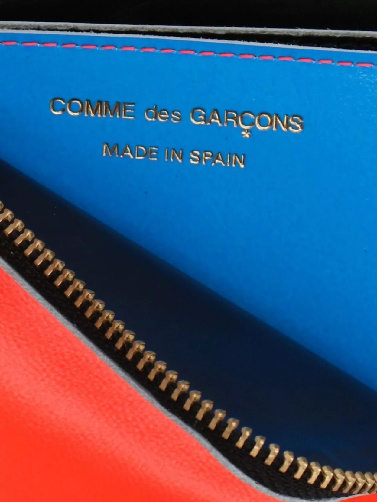 Comme des Garçons   Bold color-block wallet design